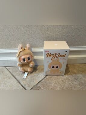 Confirmed Baba Have a Seat Vinyl Plush. Good condition.